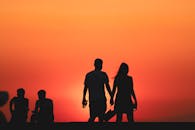 Silhouette of People During Sunset