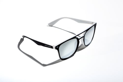 Sunglasses on a White Surface 