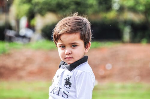 Boy Wearing White Polo Shirt