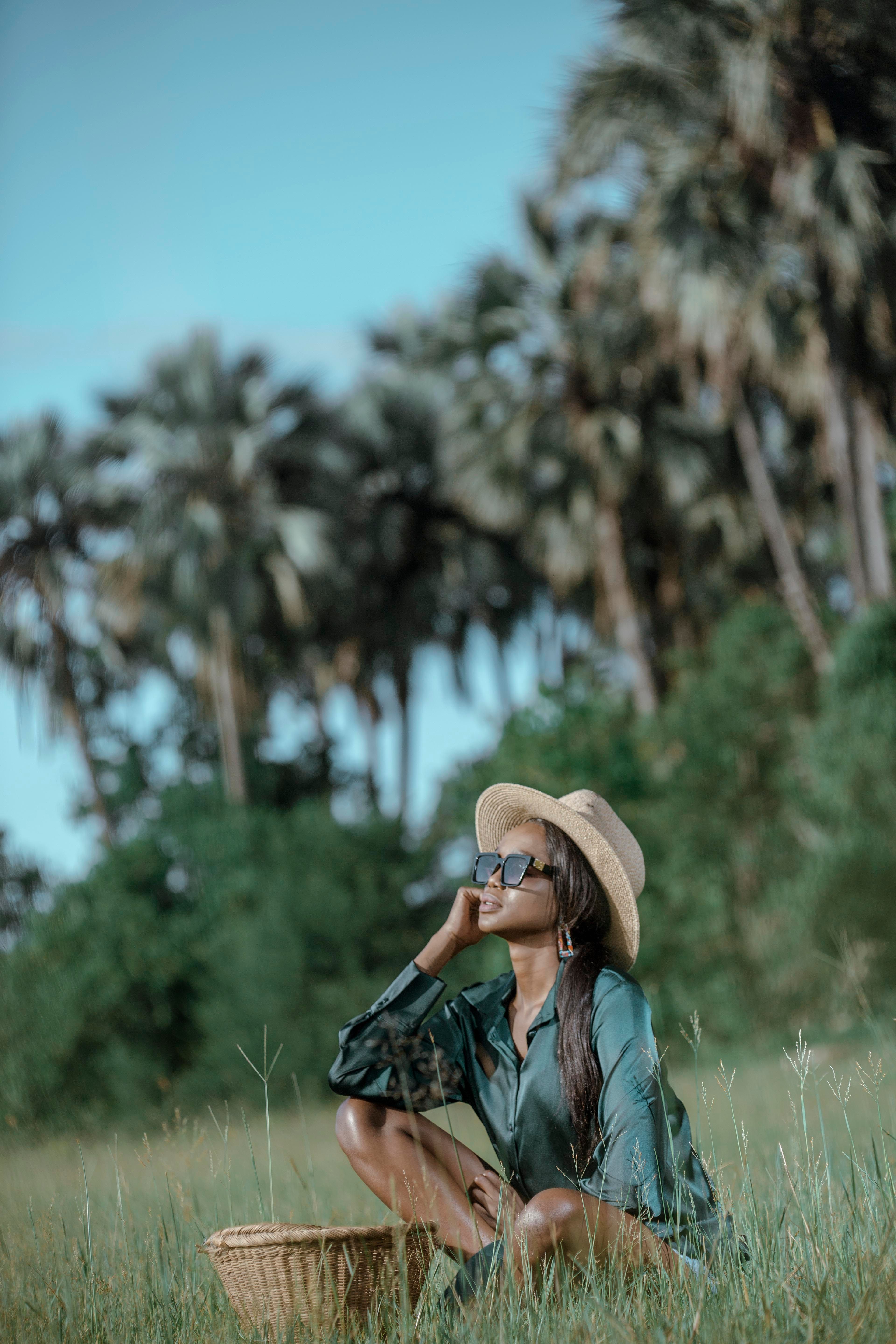 Woman in Blue Dress Standing on Brown Grass Field · Free Stock Photo