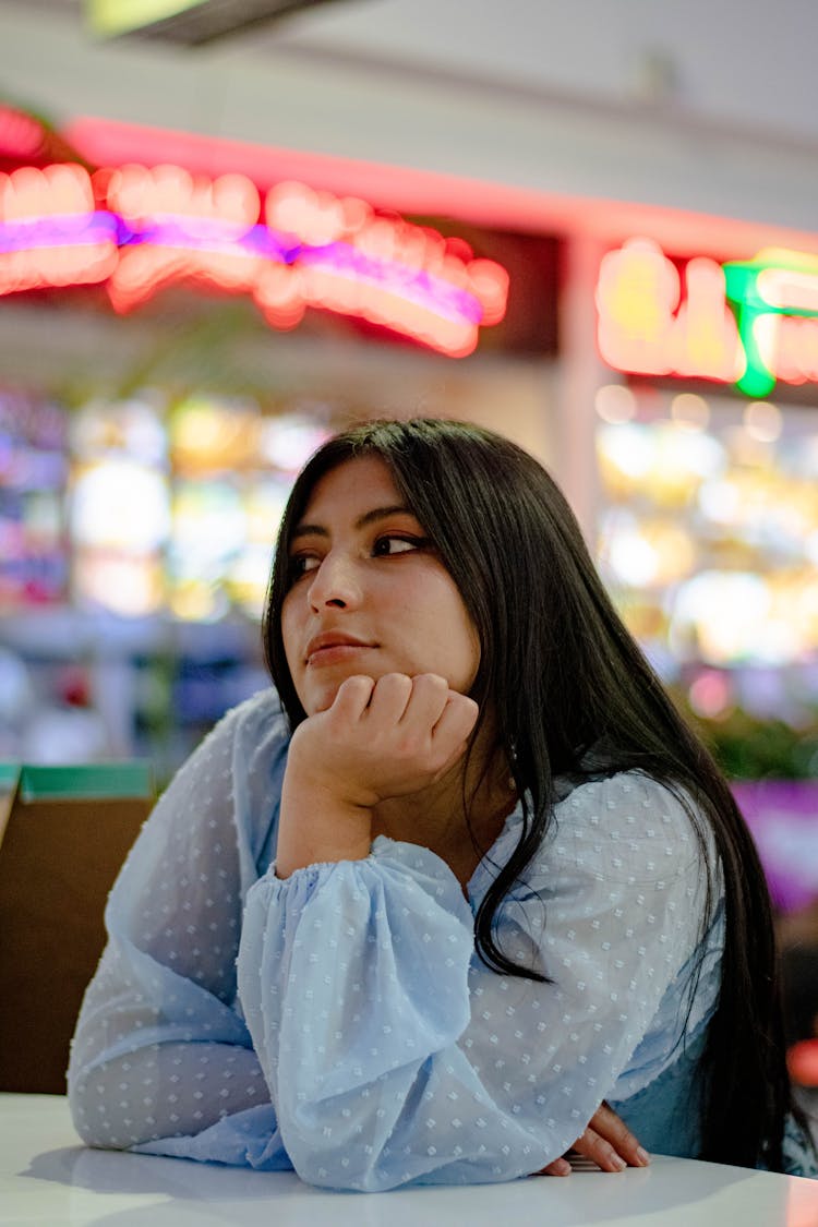 Woman With Hand On Her Chin 