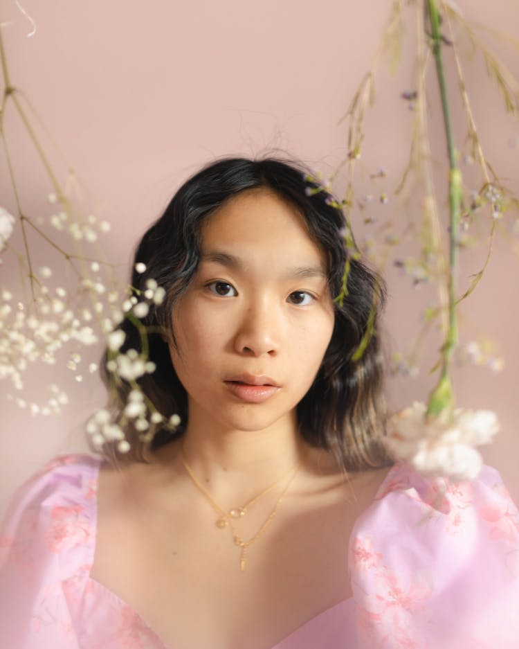 Young Woman With Black Long Hair In Pink Puff Dress