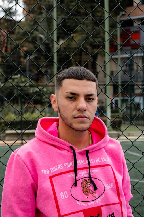 Free A Man in a Pink Hoodie Stock Photo