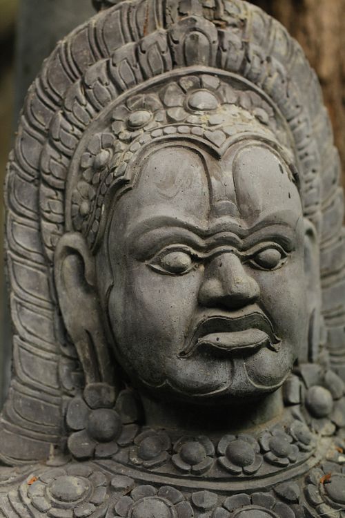 Free Close-up of a detailed ancient stone sculpture with spiritual significance. Stock Photo