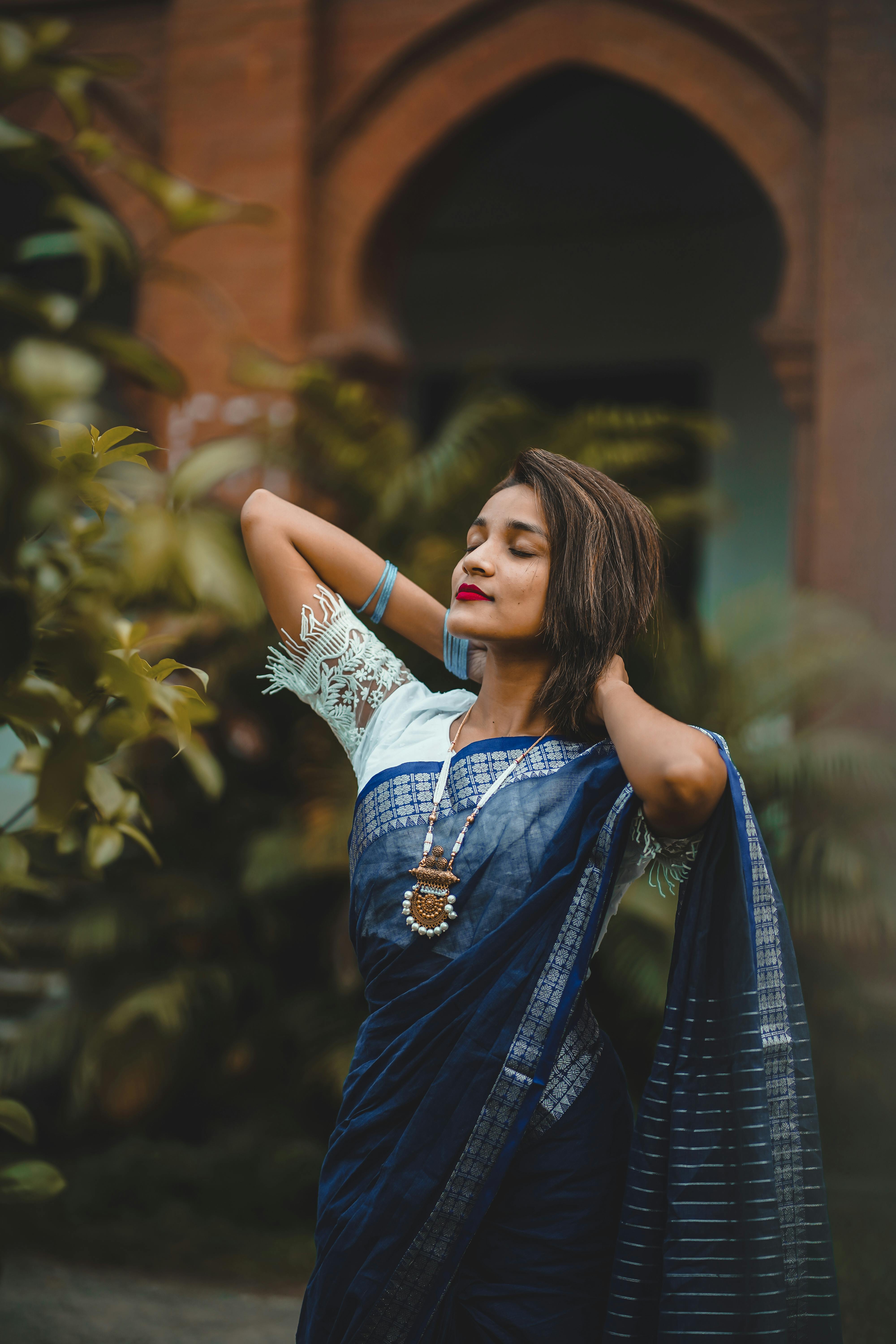 Beautiful fuschia saree with a smart printed blouse | Saree photoshoot, Saree  poses, Indian beauty saree