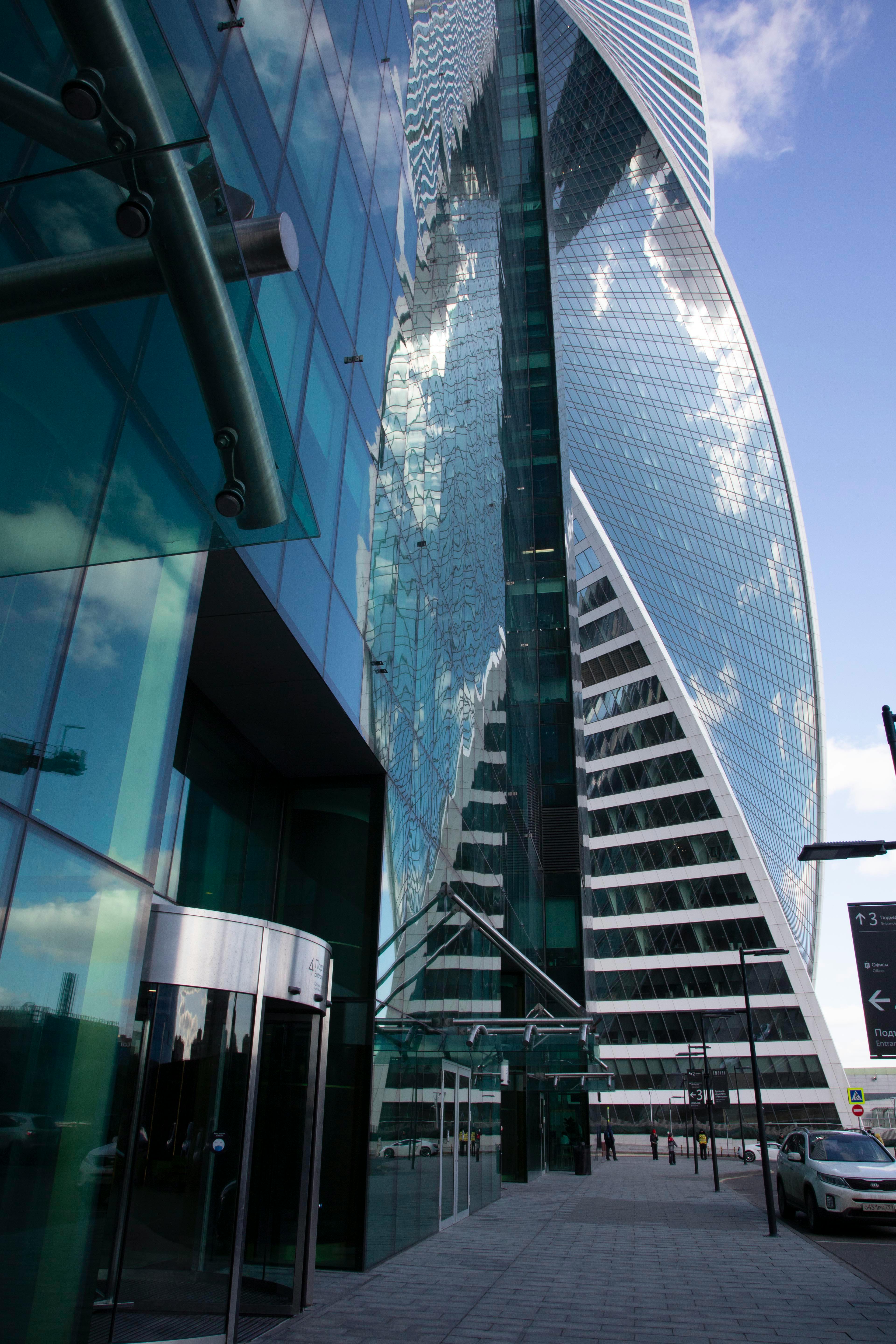 A cozy scene with a mug of coffee, a slice of cake, and a book on a wooden table