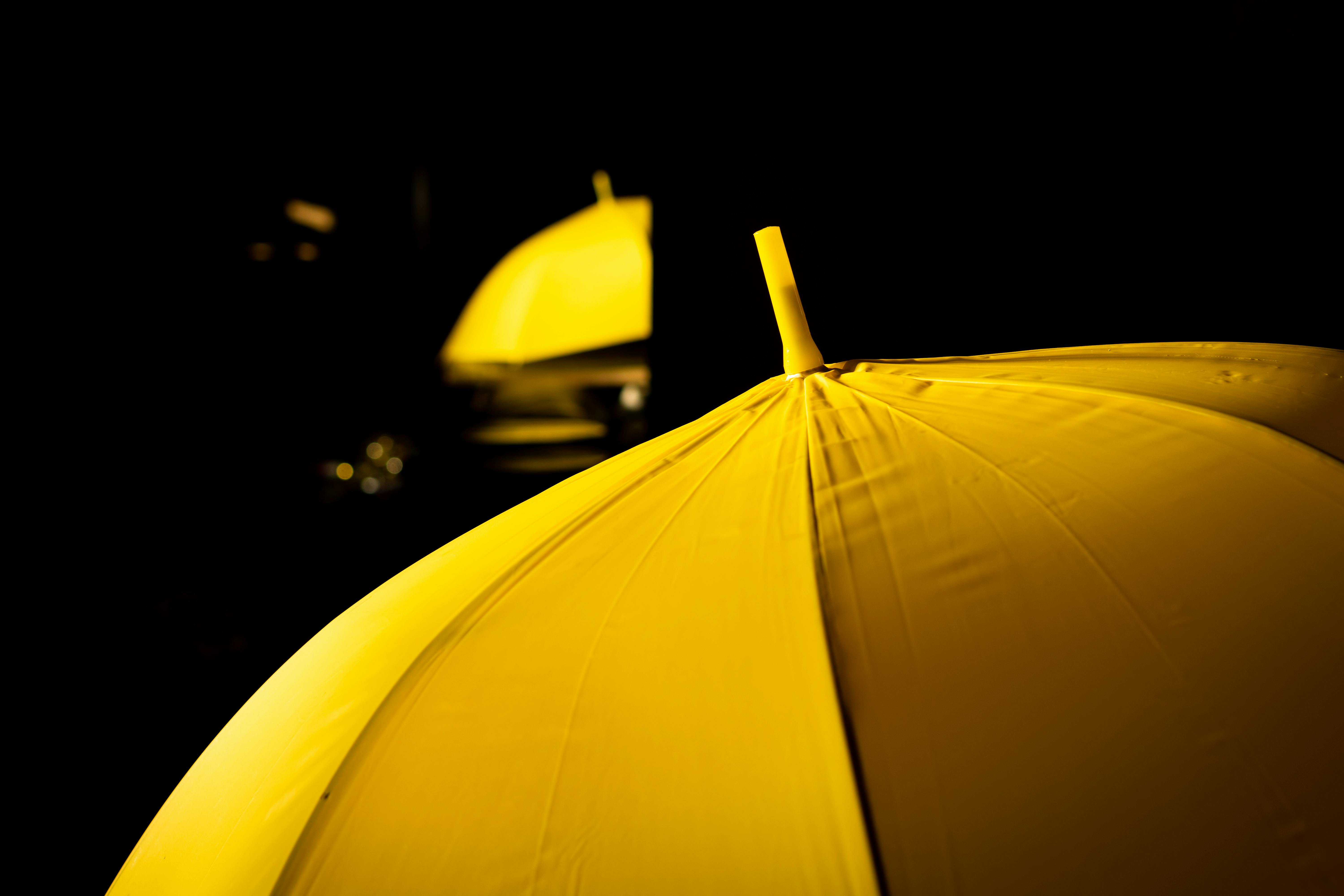Bright Yellow Umbrella in Closeup Photography · Free Stock Photo