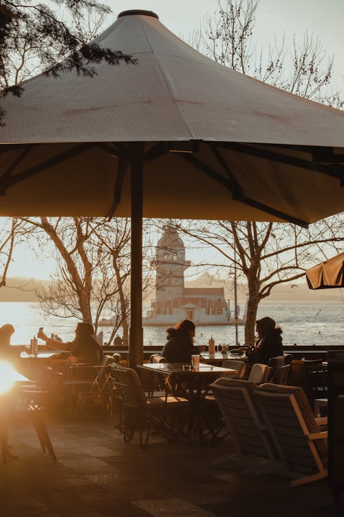 People Sitting at a Dining Area