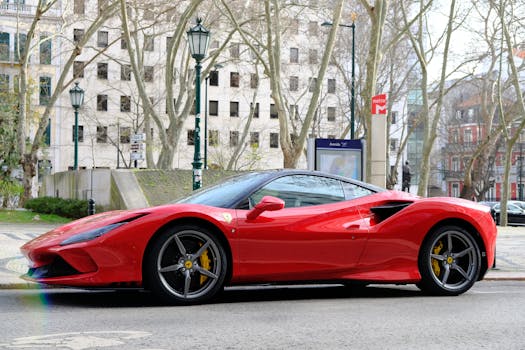 Stunning red Ferrari sports car elegantly parked in a picturesque Lisbon street.
