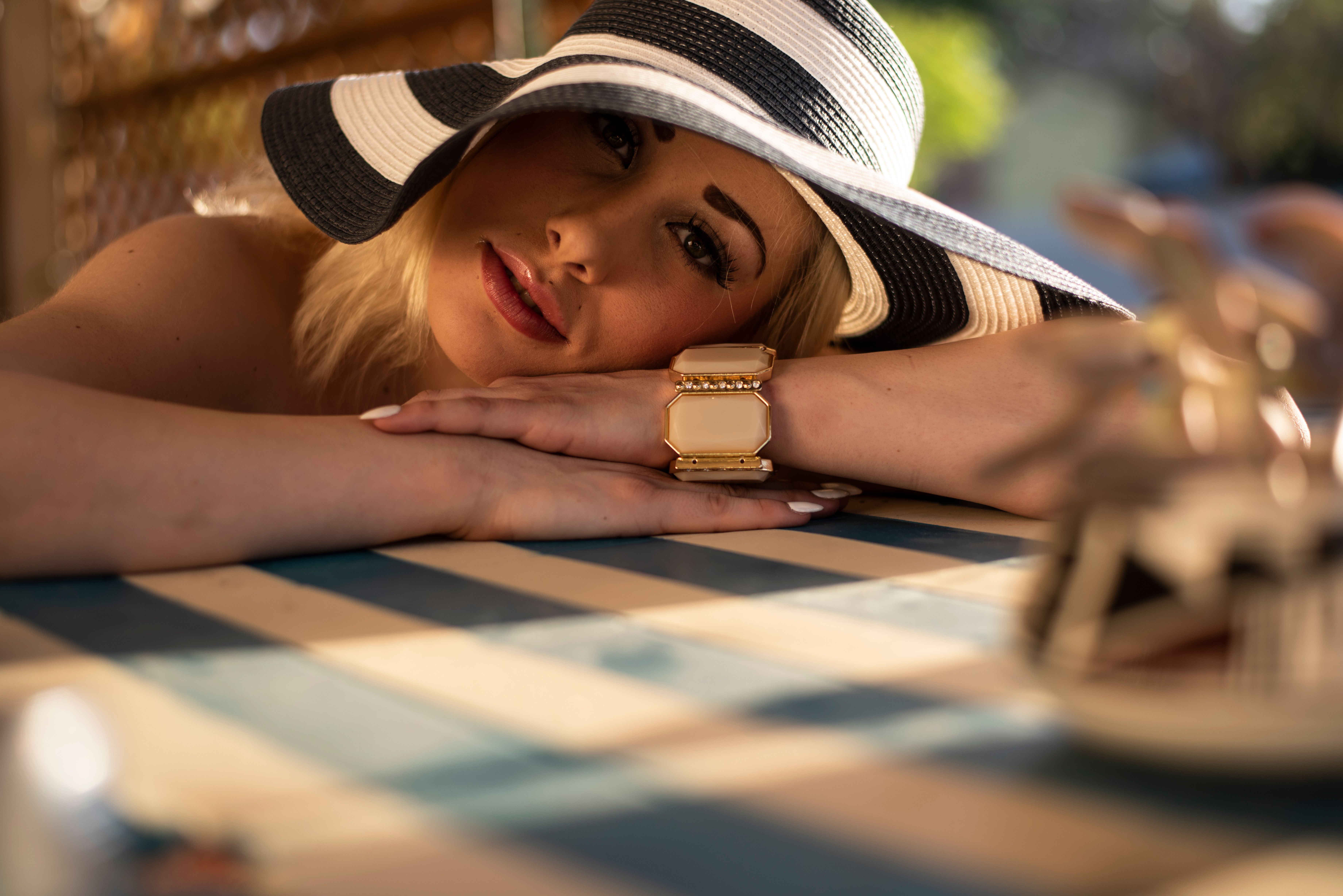 Photo of Woman in Peach Sun Hat 
