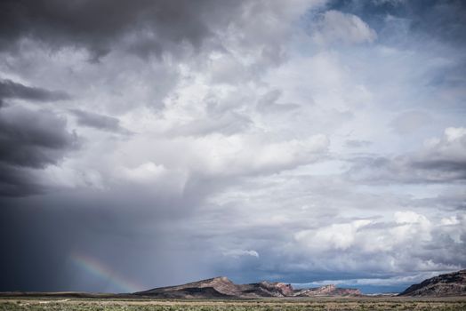 White Clouds over Brown Mountains