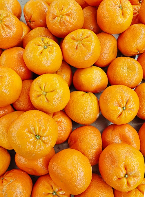 Free Close Up Photo of Bunch of Ride Oranges Stock Photo