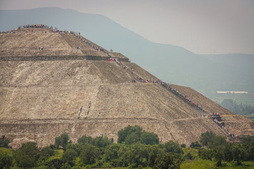 People Walking Up the Pyramid