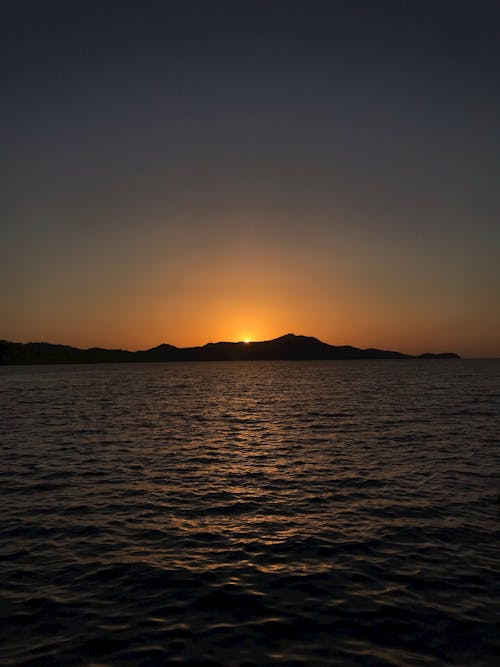 Silhouette of Mountains during Sunset