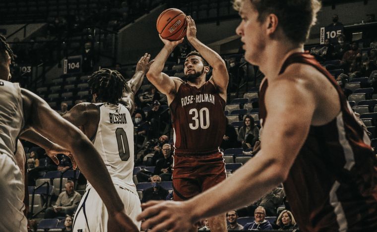 Players competing in a college basketball game — Nick Rush on Pexels