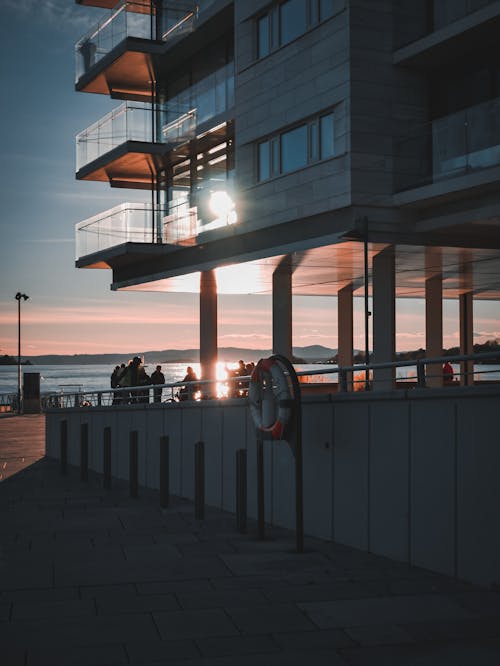 Foto profissional grátis de à beira-mar, lindo pôr do sol, sol abaixo