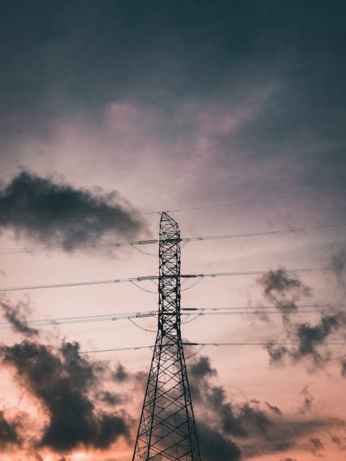 Black Electric Tower Under Evening Sky