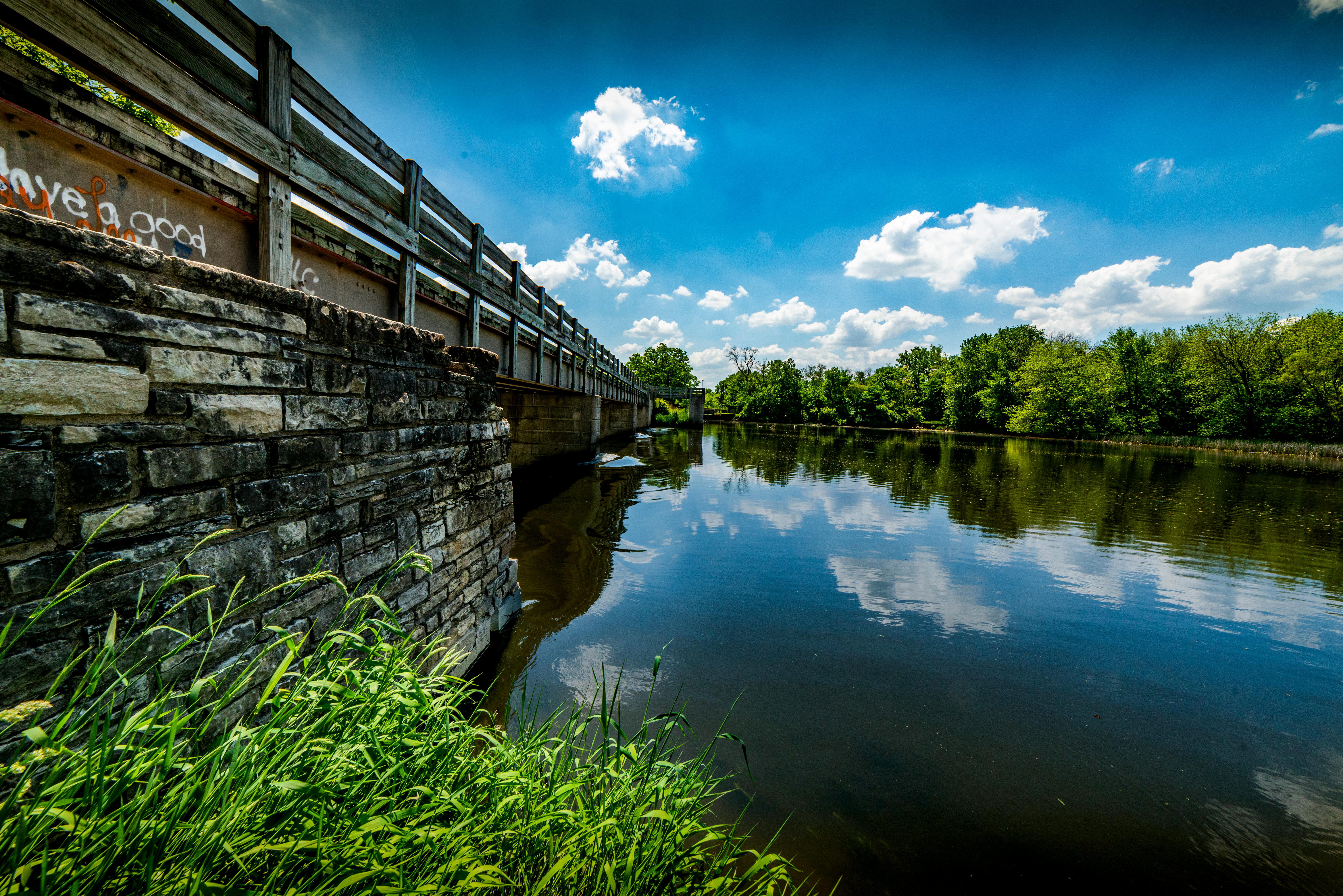 Gray Steel Bridge Near Body of Water · Free Stock Photo