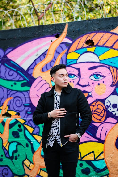 Gratis lagerfoto af afslappet, asiatisk mand, graffiti væg