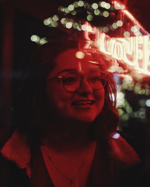 A Portrait of a Woman under a Red Light