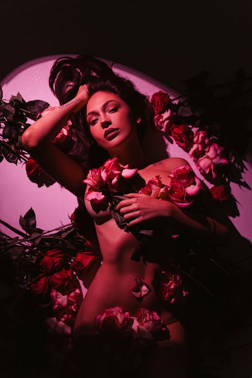 Free Naked Woman Covered by Flowers Stock Photo