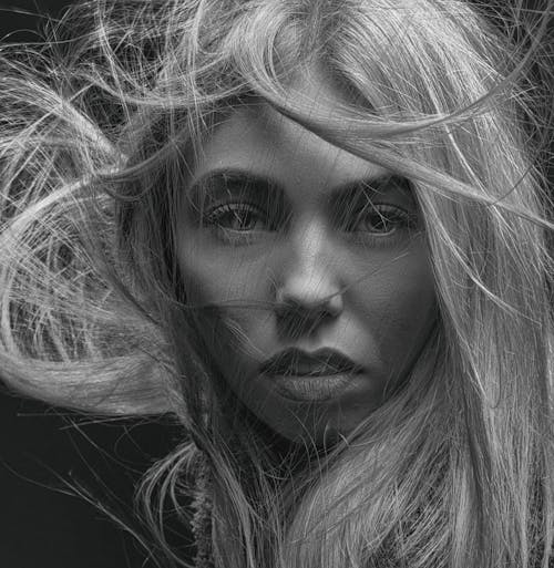 Black and White Photo of a Beautiful Woman with Messy Hair