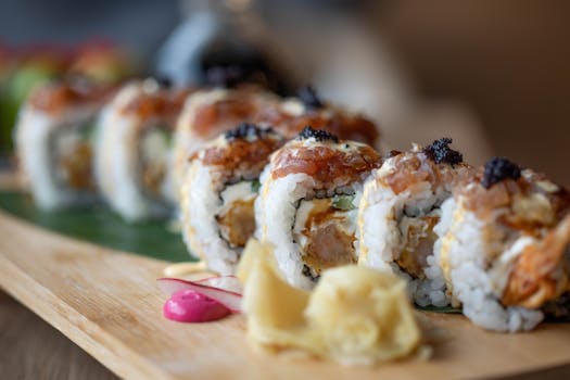 Mouthwatering sushi rolls served on a wooden board, featuring fresh ingredients.