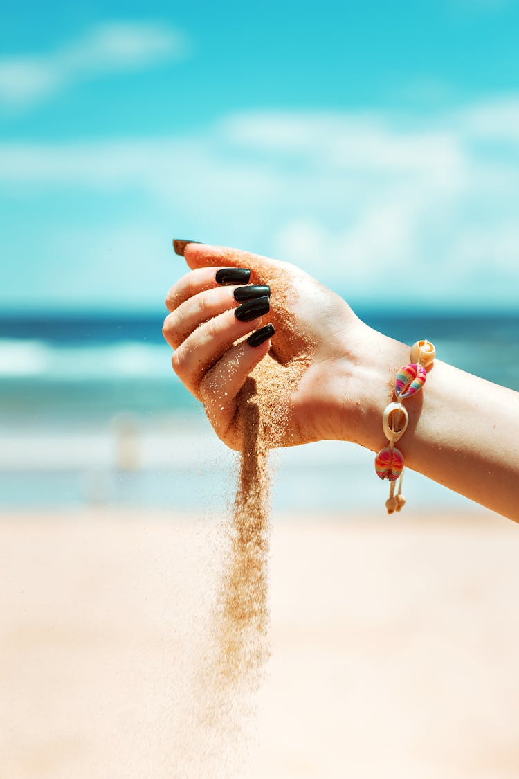 Hand Pouring Sand 