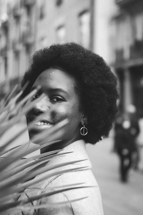 Grayscale Photo of Woman in White Collared Shirt