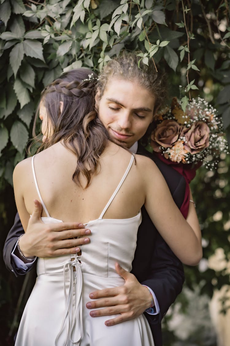 Bride And Groom Hugging Each Other