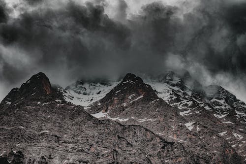 Grayscale Photo of Mountain Hill