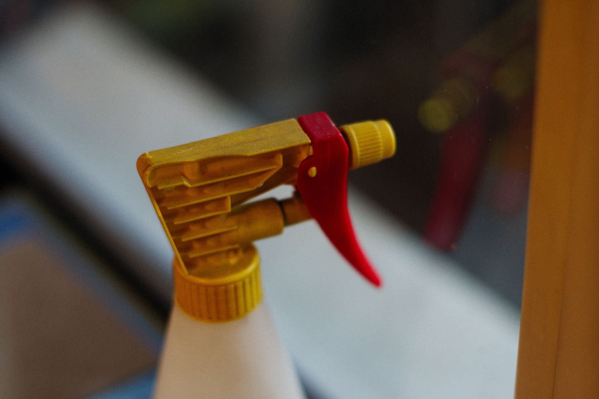 Red and Yellow Spray Bottle