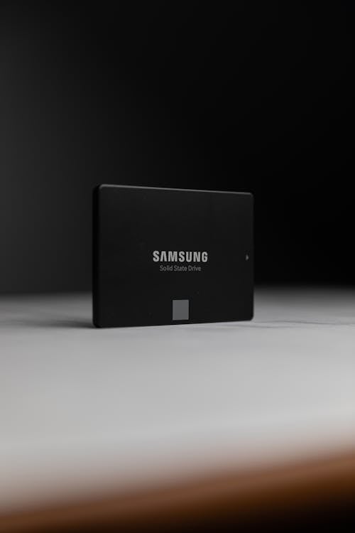 Free Black Samsung Solid-State Drive on White Surface Stock Photo