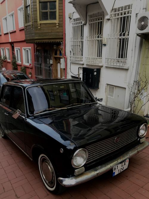 Free Classic black car parked on a charming street in Üsküdar, Istanbul. Stock Photo