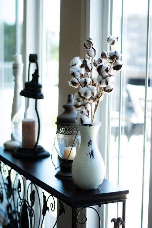 Free White Flowers in Ceramic Vase on a Table Stock Photo
