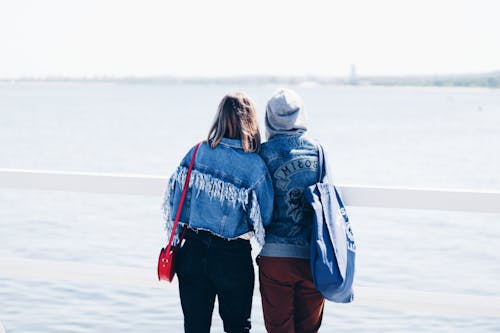 Two People Looking at the Beach