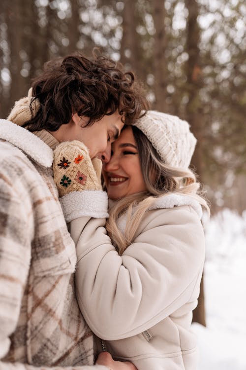 Free Boyfriend and Girlfriend Hugging Outside in Winter Stock Photo