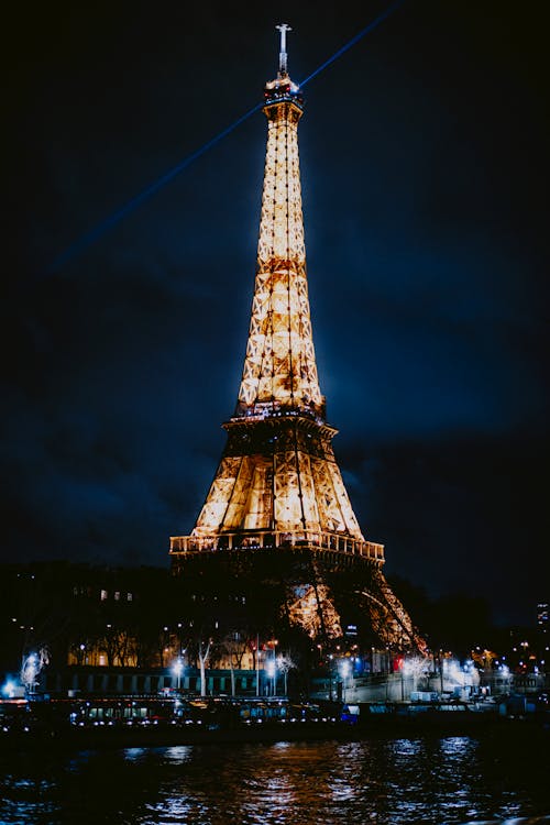 Free Eiffel Tower with Lights at Night Stock Photo