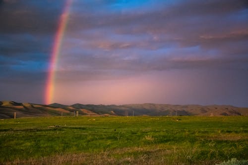 Fotografia De Paisagem De Montanhas Com Arco íris