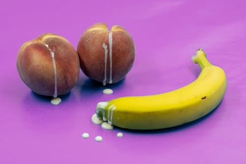 Boobs and penis with fruit, banana and peaches