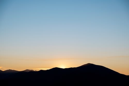 Free Бесплатное стоковое фото с восход, голубое небо, горы Stock Photo