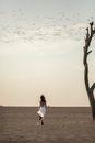 Woman Running in Desert