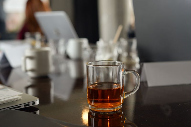 herbal peppermint tea in a clear glass mug