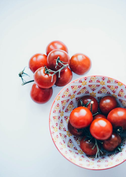 Red Cherry Fruit on Blue and White Floral Ceramic Plate