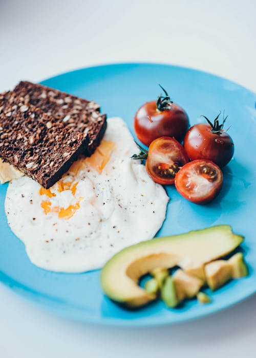 Free Cooked Food on Blue Ceramic Plate Stock Photo