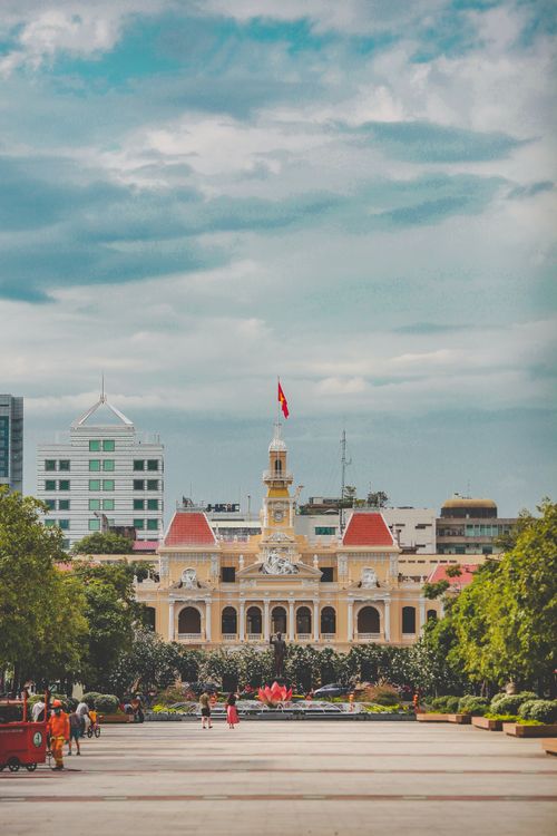 Free A vibrant cityscape featuring the iconic People's Committee Building in Ho Chi Minh City, Vietnam. Stock Photo
