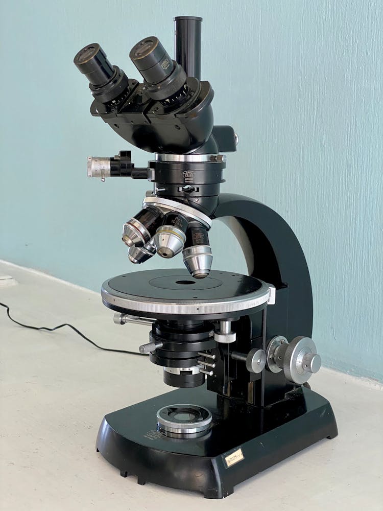 Black And Silver Microscope On The Table