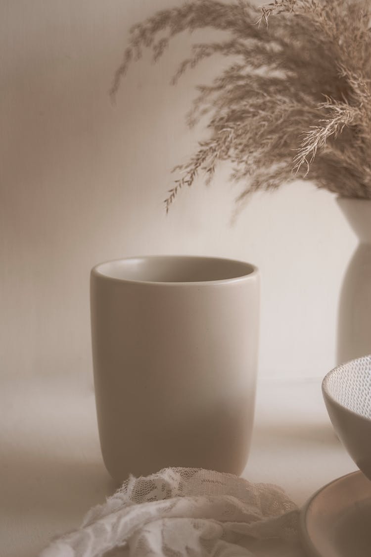 White Ceramic Vase On White Table