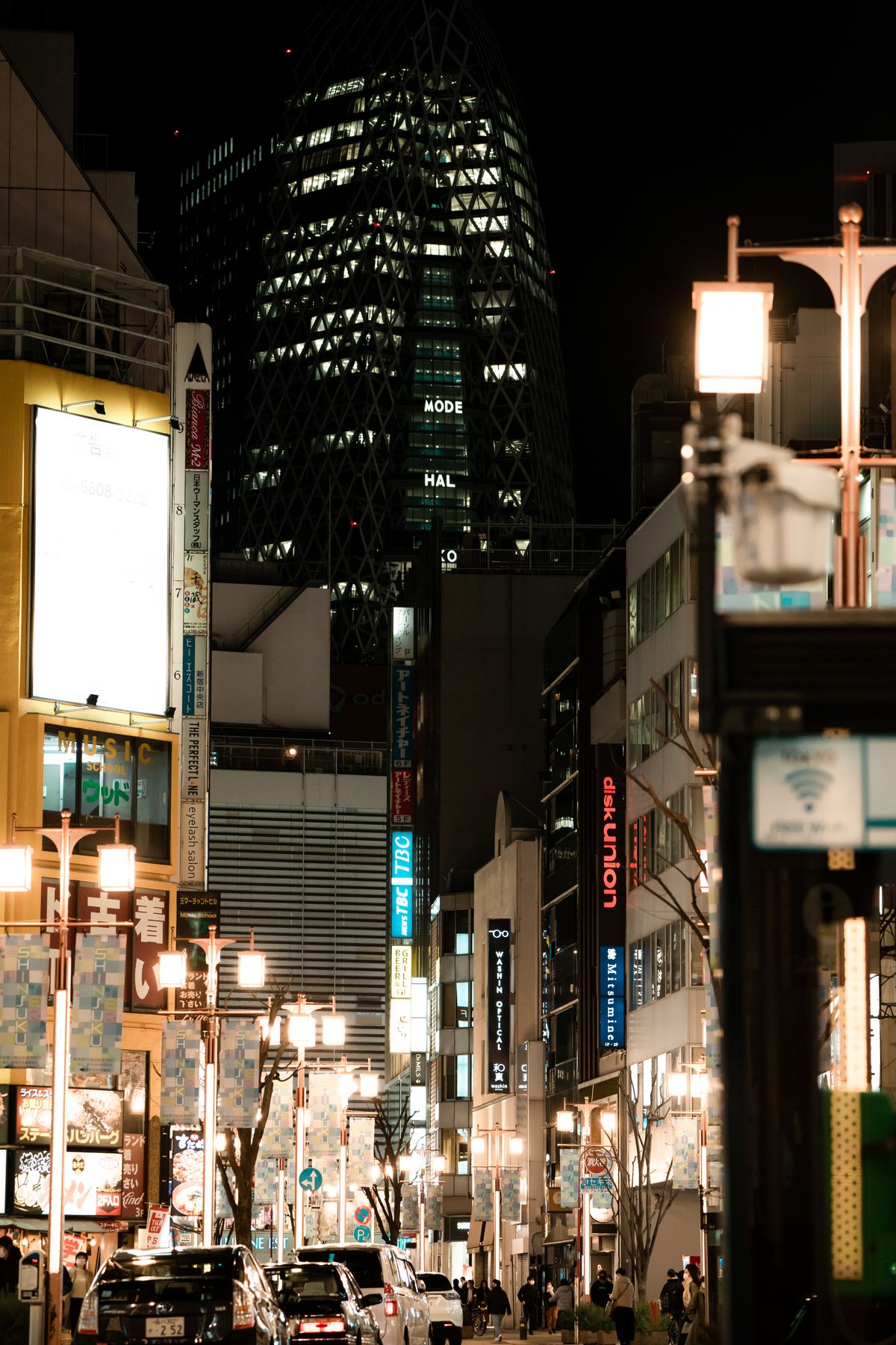 Shinjuku neon lights and skyscrapers at night in Tokyo, Japan