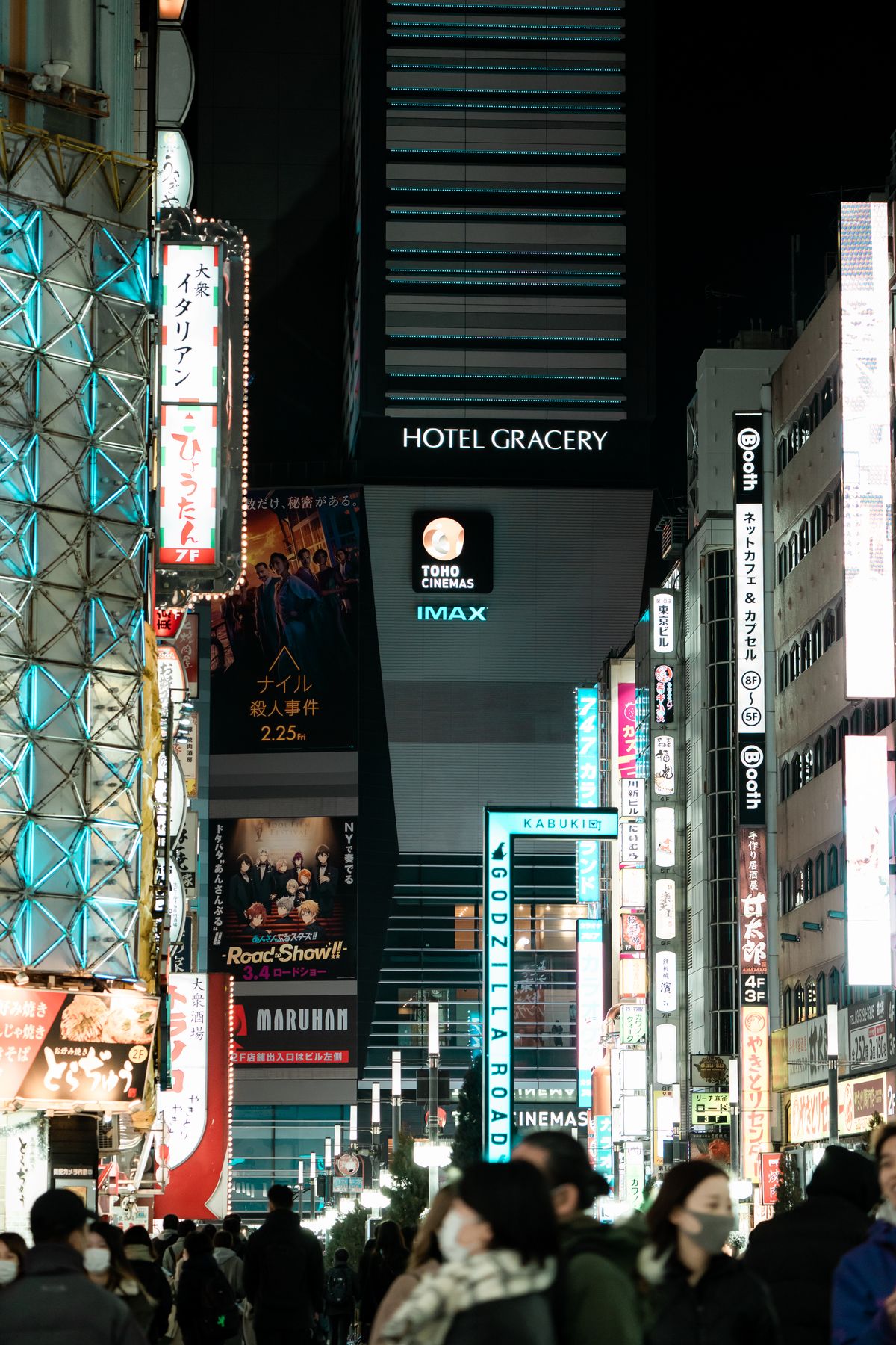 Tokyo cityscape at dusk with illuminated buildings in Shinjuku district